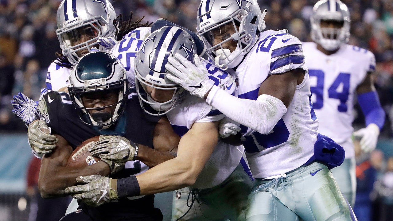 Elliott, Prescott lead Cowboys past Eagles 27-20